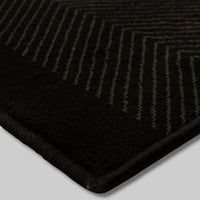 Dancette Border Black runner close up