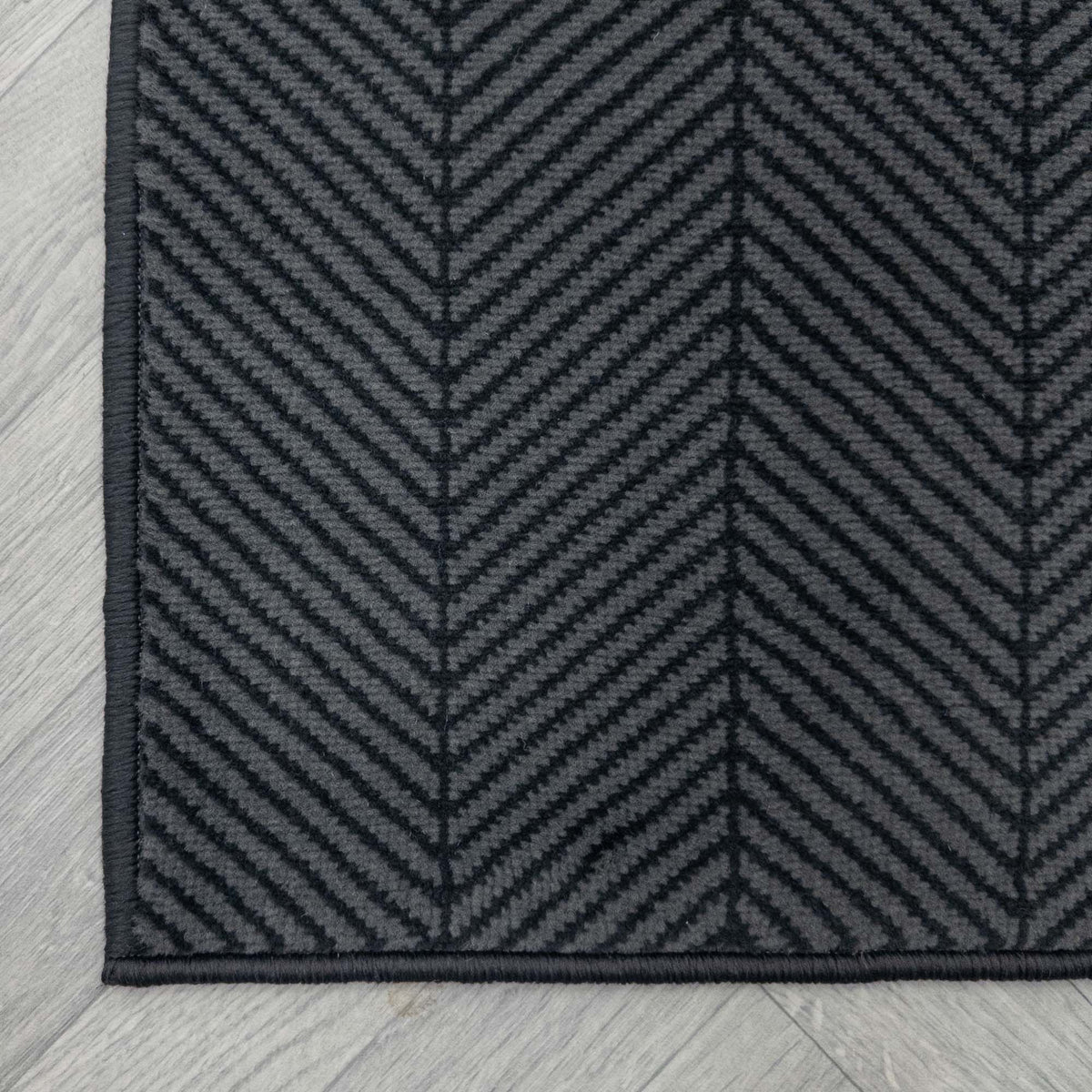Dancette Dark Grey rug corner