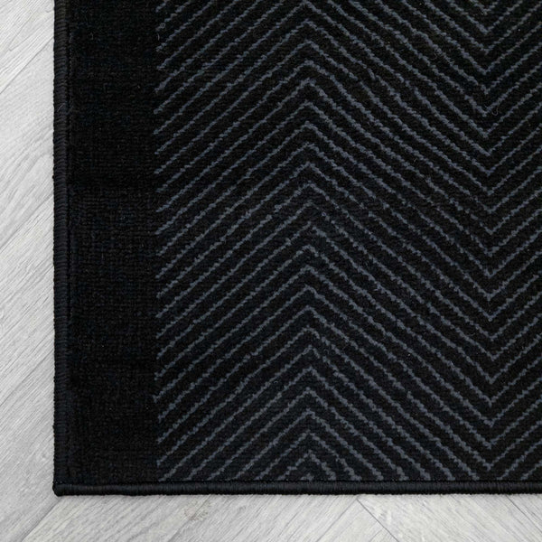 Dancette Border Black rug corner